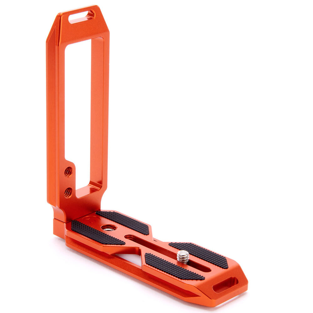 3-Legged-Thing QR11 FBC-2 universal L-bracket in orange, Arca-Swiss compatible with adjustable vertical and horizontal mounting via quick-release clamp.