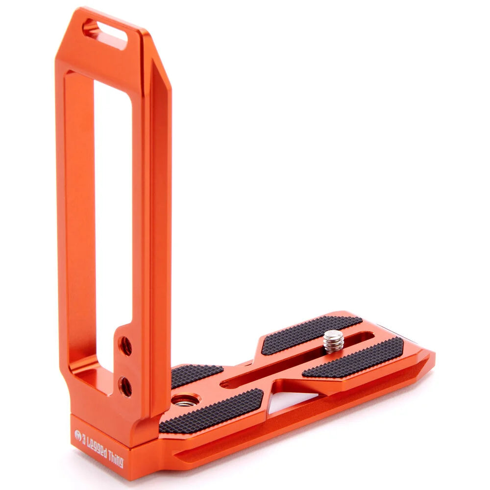 3-Legged-Thing QR11 FBC-2 universal L-bracket in orange, Arca-Swiss compatible with adjustable vertical and horizontal mounting via quick-release clamp.