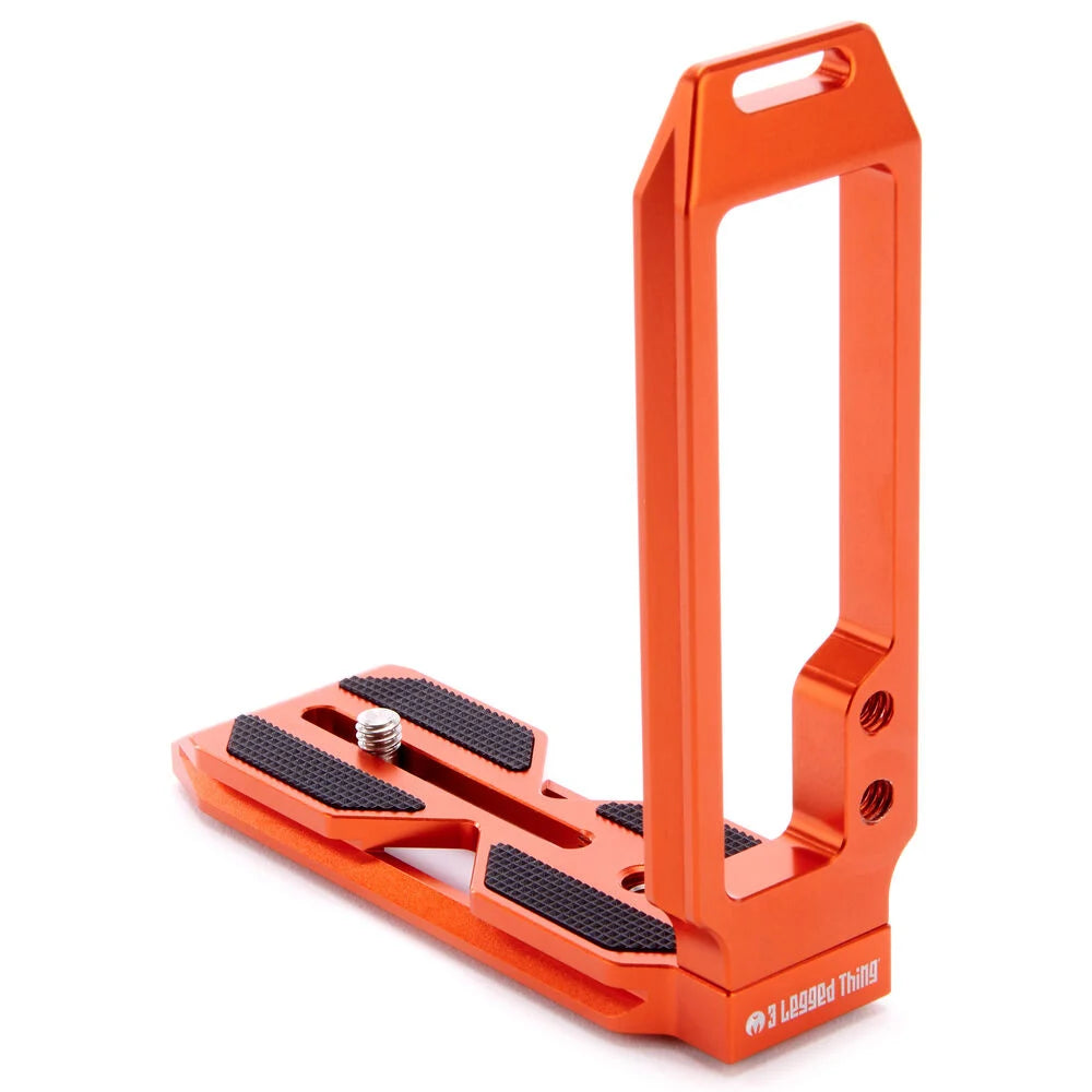 3-Legged-Thing QR11 FBC-2 universal L-bracket in orange, Arca-Swiss compatible with adjustable vertical and horizontal mounting via quick-release clamp.