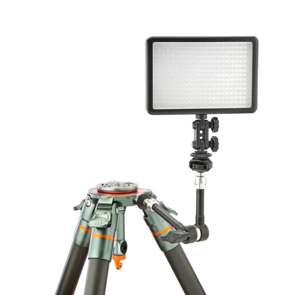 Video light on a tripod with a white background