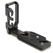 Black camera accessory on a white background