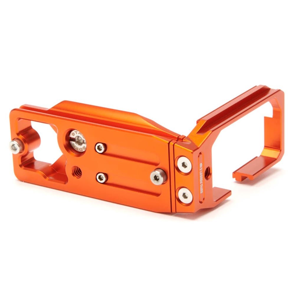 Orange metal bracket with screws on a white background