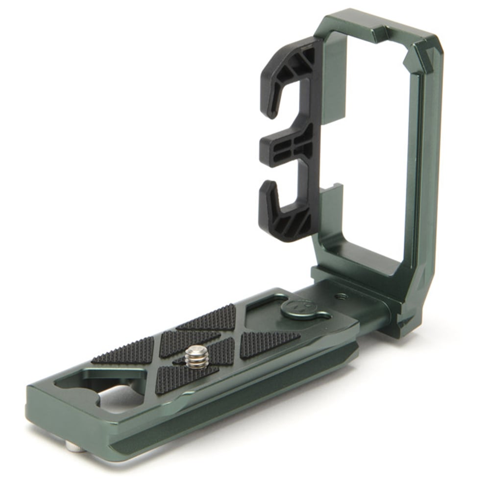 Camera accessory with a green base and black clamp on a white background