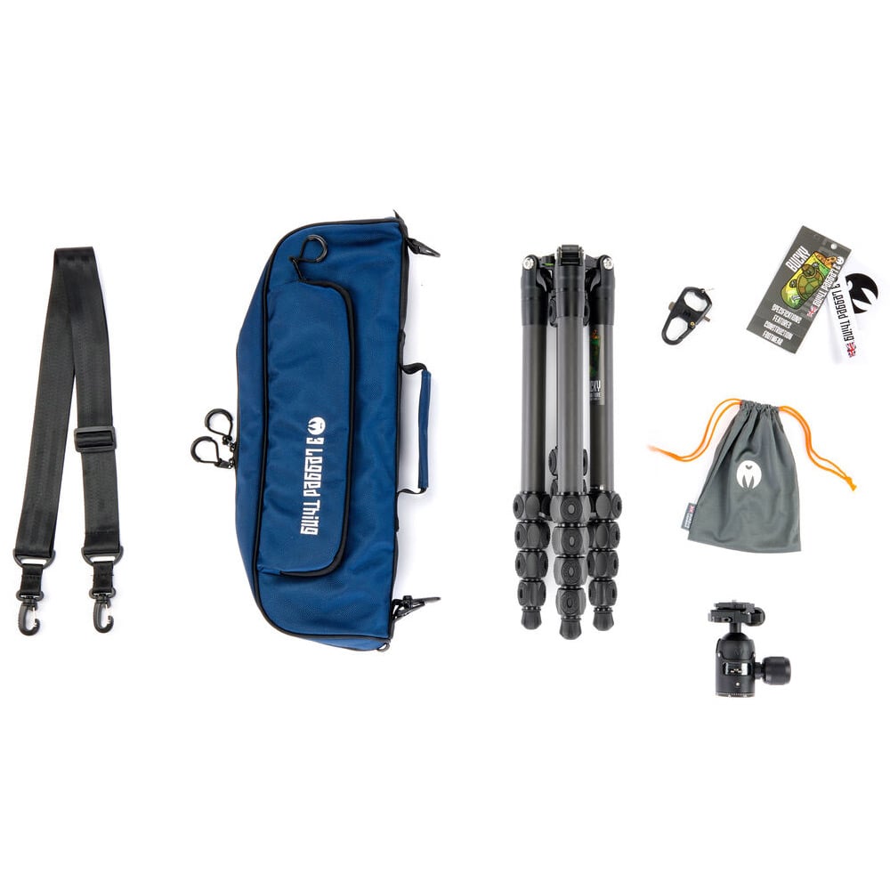 Camera accessories including a blue bag, tripod, strap, and other equipment on a white background