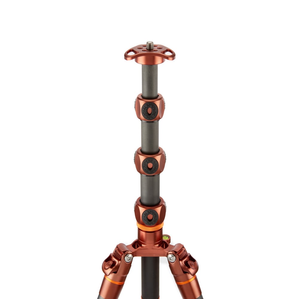 Camera tripod with copper and black design on a white background