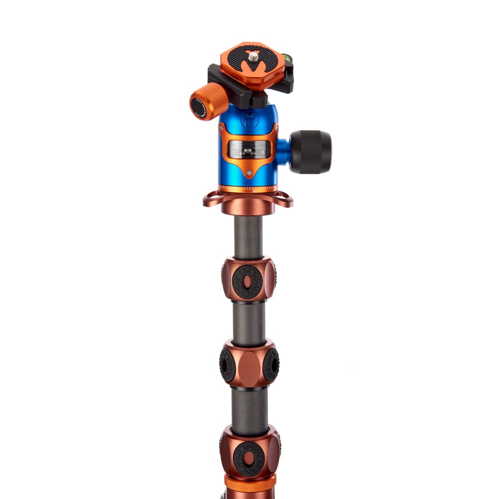 Camera tripod with ball head on a white background