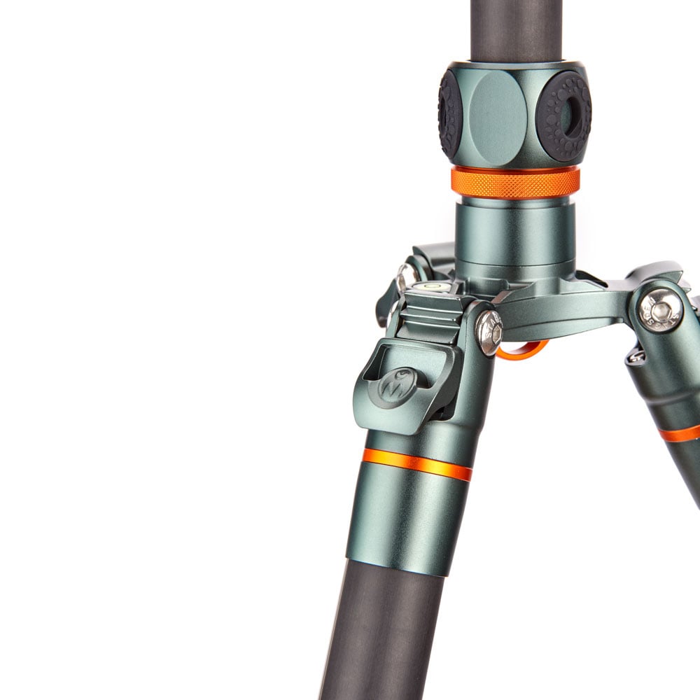 Close-up of a tripod with orange accents on a white background