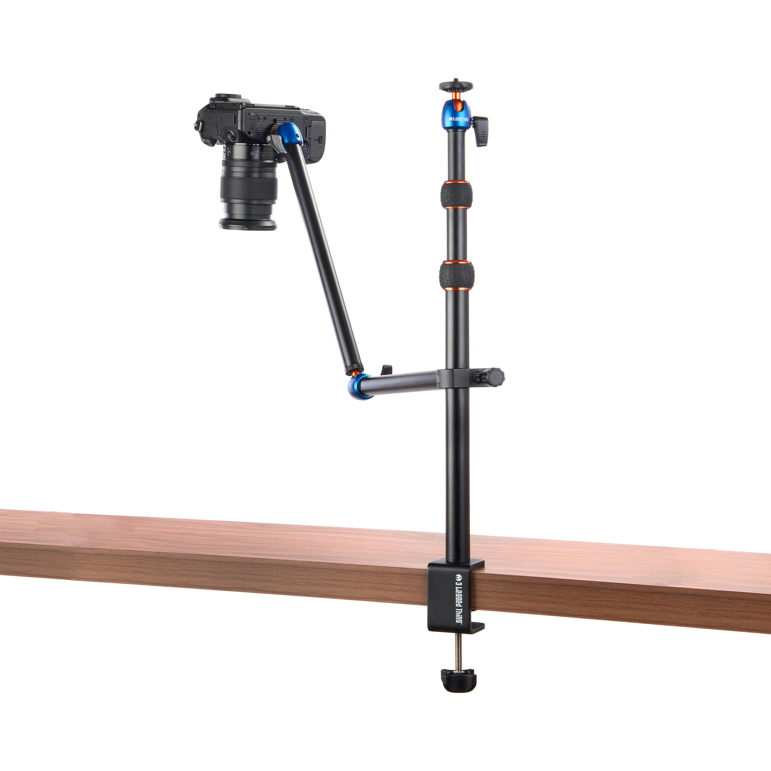 3-Legged-Thing Camera Desk Mount Stand with articulated arm — vertical clamped pole with interconnected horizontal arm and ball-joint extender.