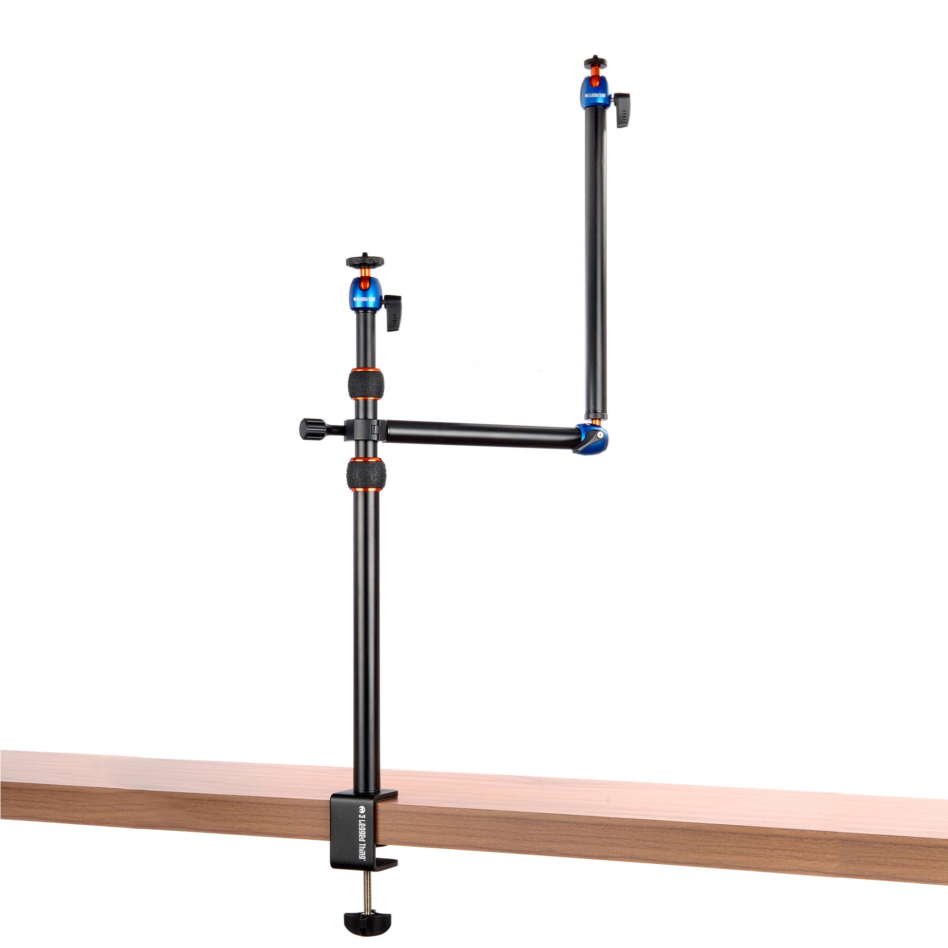 3-Legged-Thing Camera Desk Mount Stand with articulated arm — vertical clamped pole with interconnected horizontal arm and ball-joint extender.