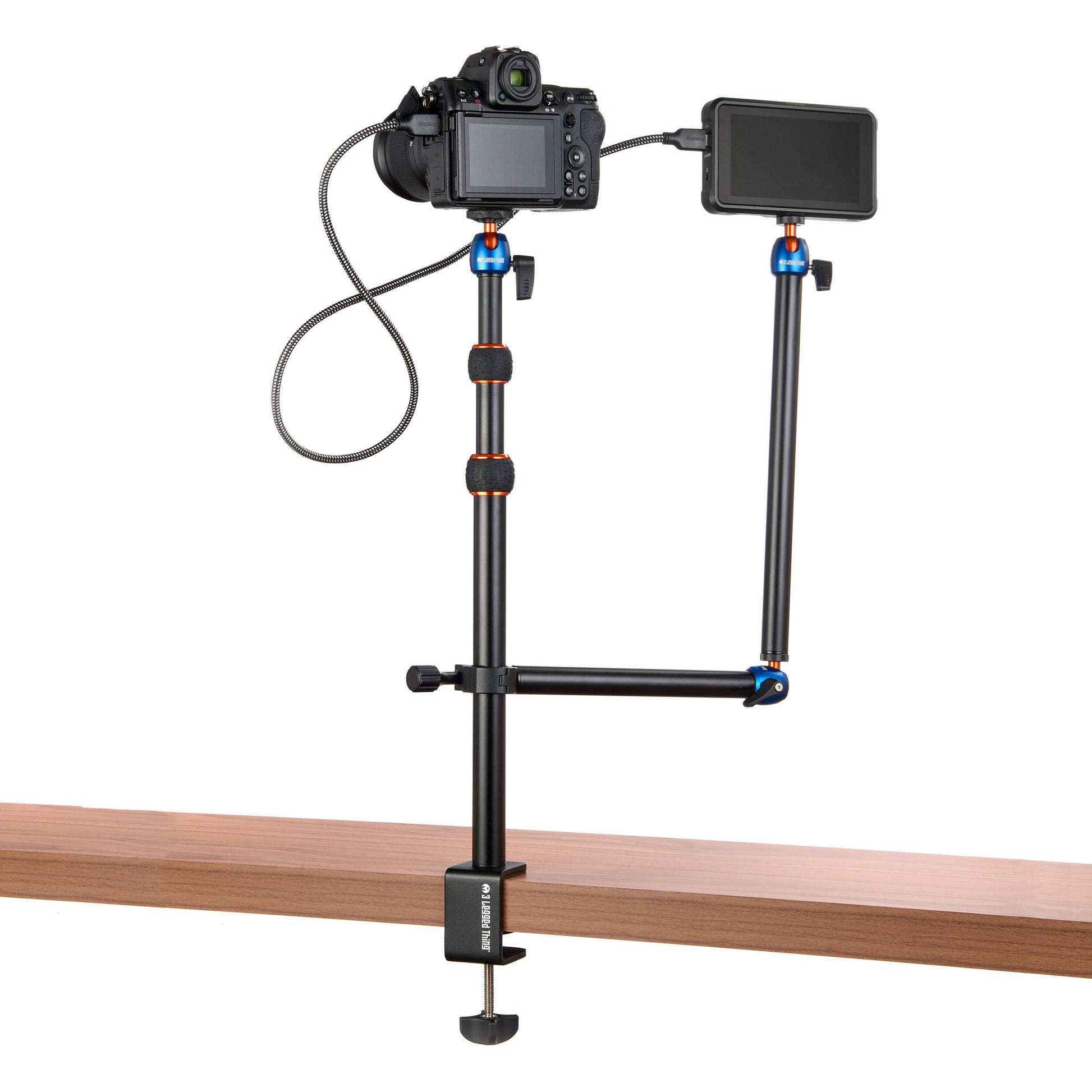 3-Legged-Thing Camera Desk Mount Stand with articulated arm — vertical clamped pole with interconnected horizontal arm and ball-joint extender.