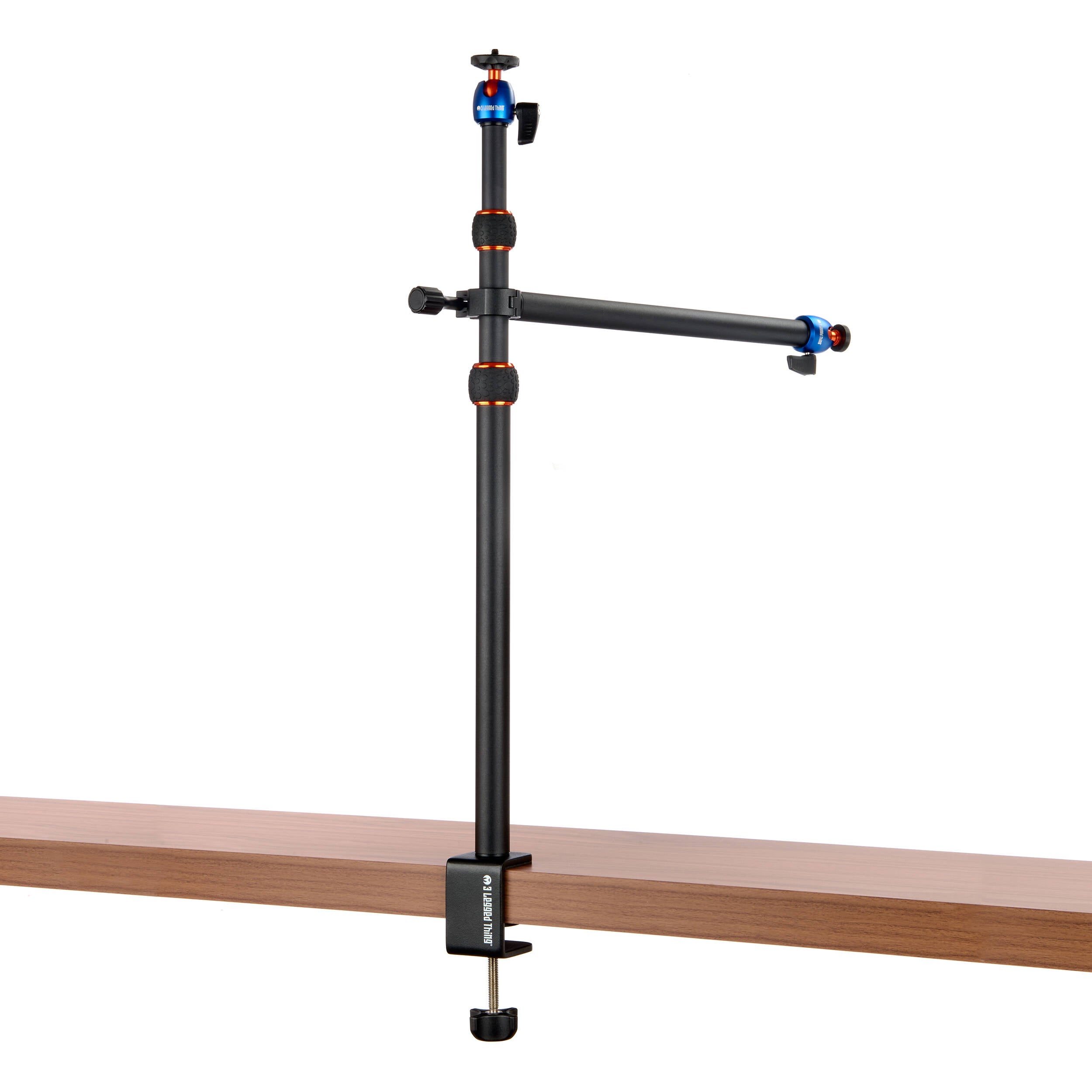 3-Legged-Thing Camera Desk Mount Stand with Auxiliary Arm — table-clamped vertical pole with a horizontal extension arm and additional articulating auxiliary arm with ball heads.