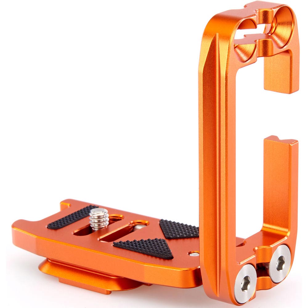 Orange metal foot peg on a white background