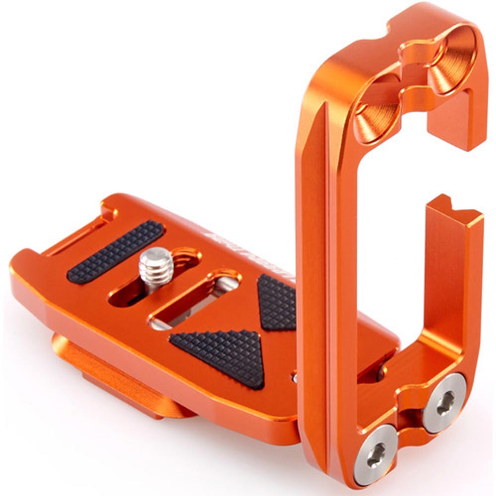 Orange metal clamp on a white background