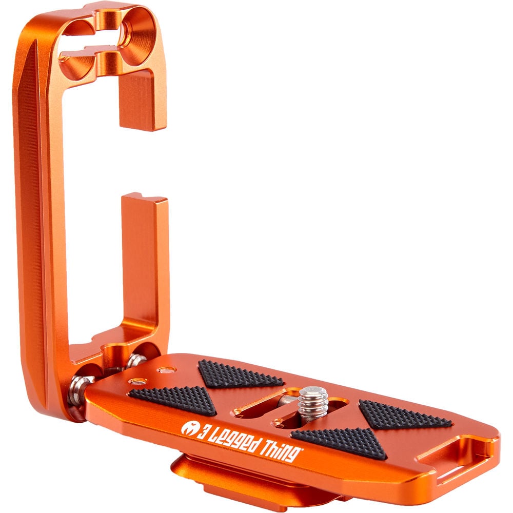 Orange metal foot peg with '3 Logged Thing' branding on a white background