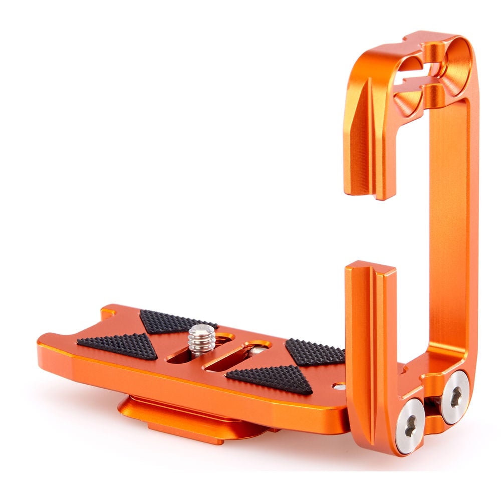 Orange metal foot peg on a white background