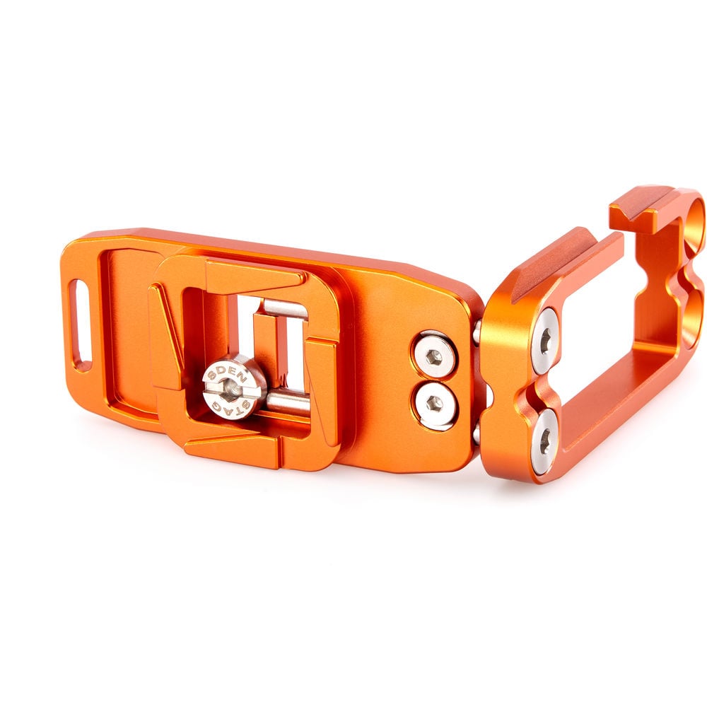Orange metal bracket with screws on a white background