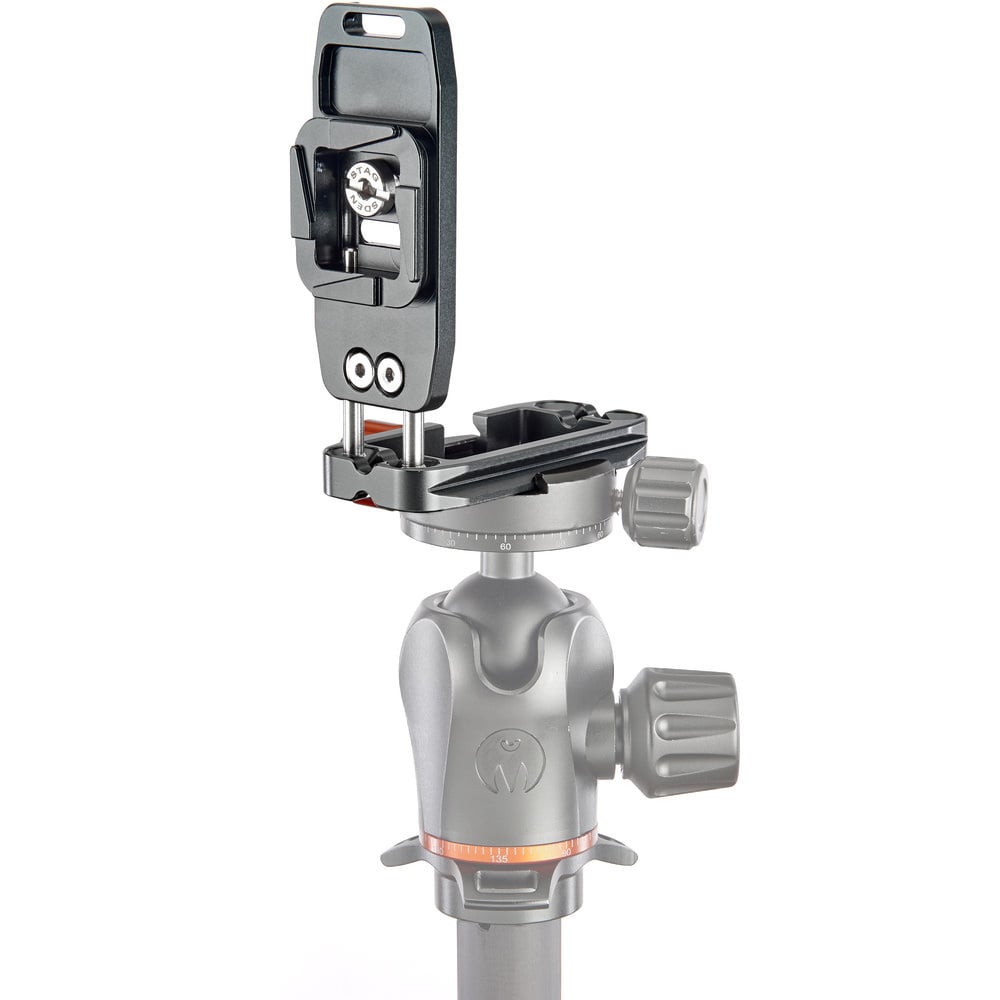 Camera tripod head with quick release plate on a white background