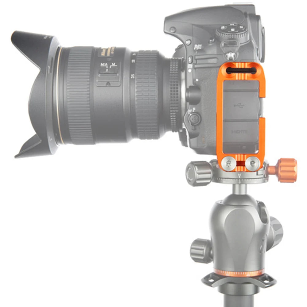 3 Legged Thing Ellie‑C Universal L‑Bracket in copper orange anodised finish, showing adjustable Arca‑type dovetail base with rubber grip pads, stainless steel sliding rods and an upright vertical plate configured for landscape-to-portrait photography.