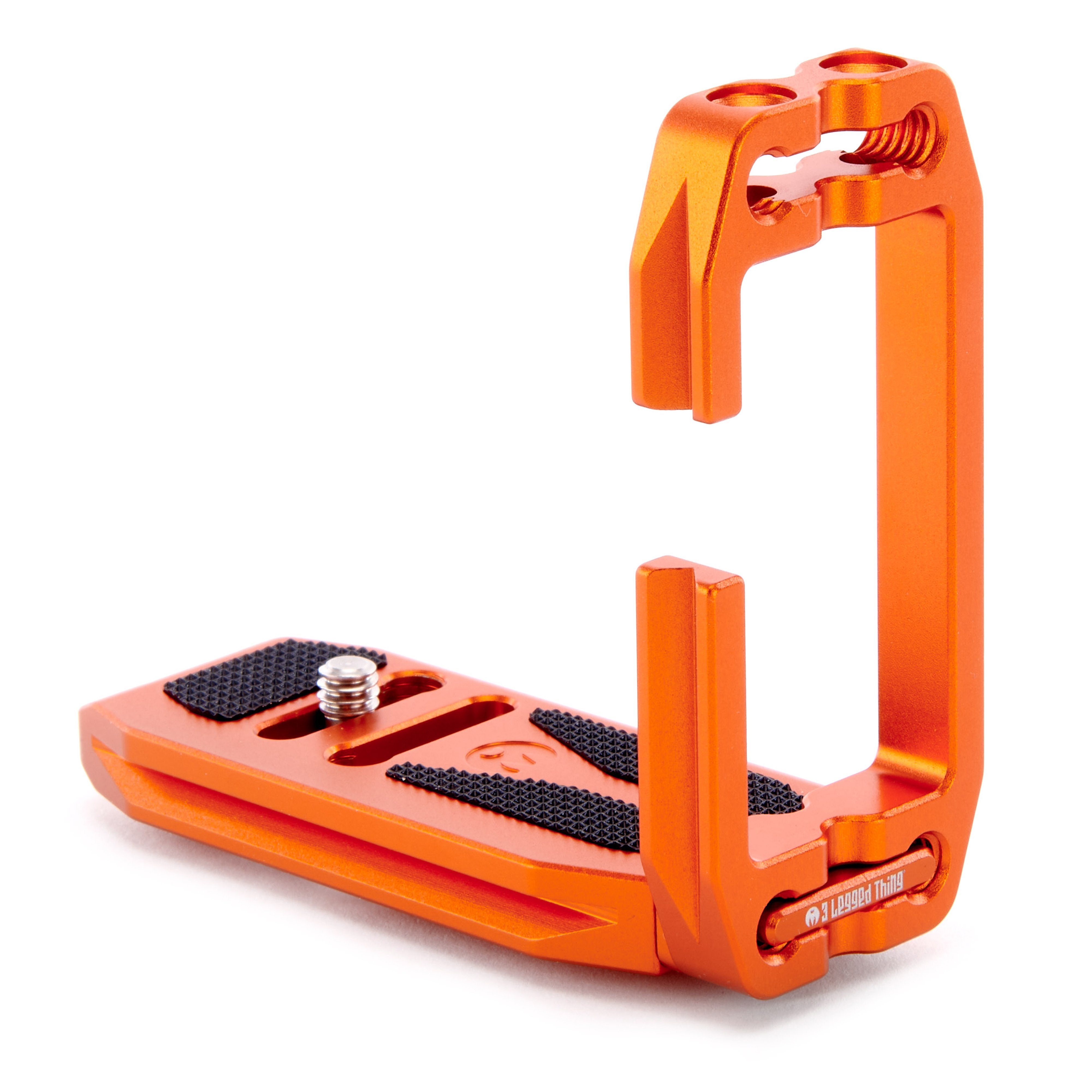 Orange metal clamp with black rubber pads on a white background