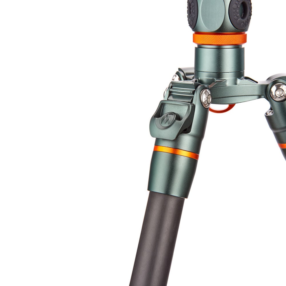 Close-up of a tripod with orange accents on a white background