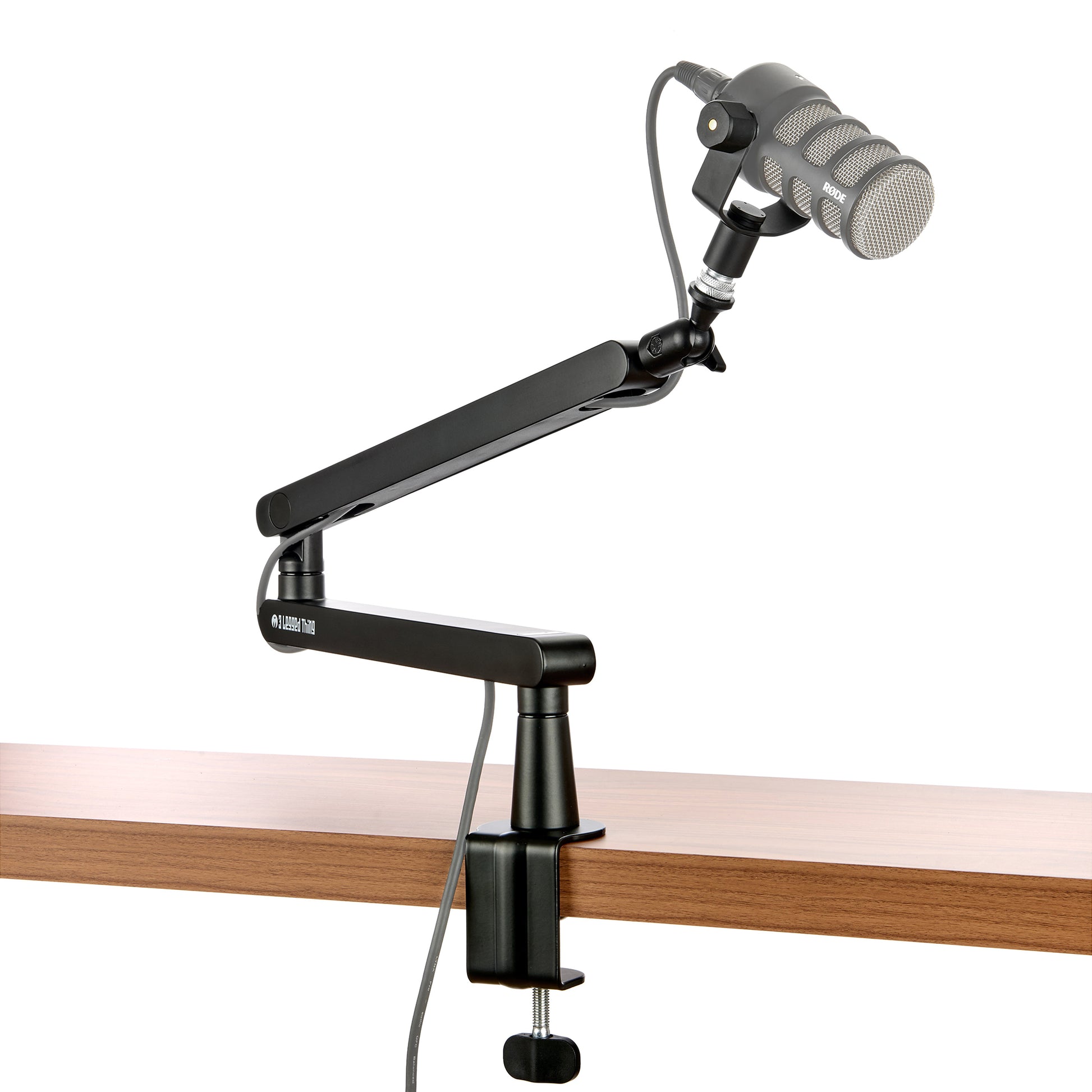 The Microphone Arm is a versatile solution that features height adjustment, built-in cable management, and secure mounting for microphones up to 1 kg.