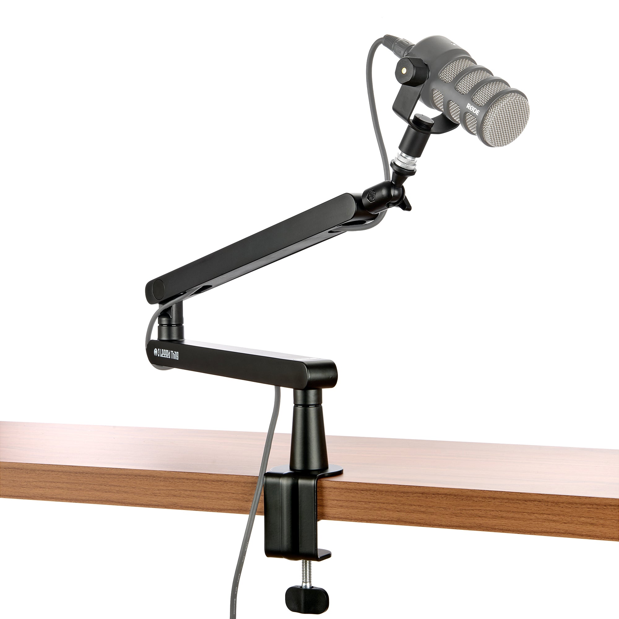 The Microphone Arm is a versatile solution that features height adjustment, built-in cable management, and secure mounting for microphones up to 1 kg.