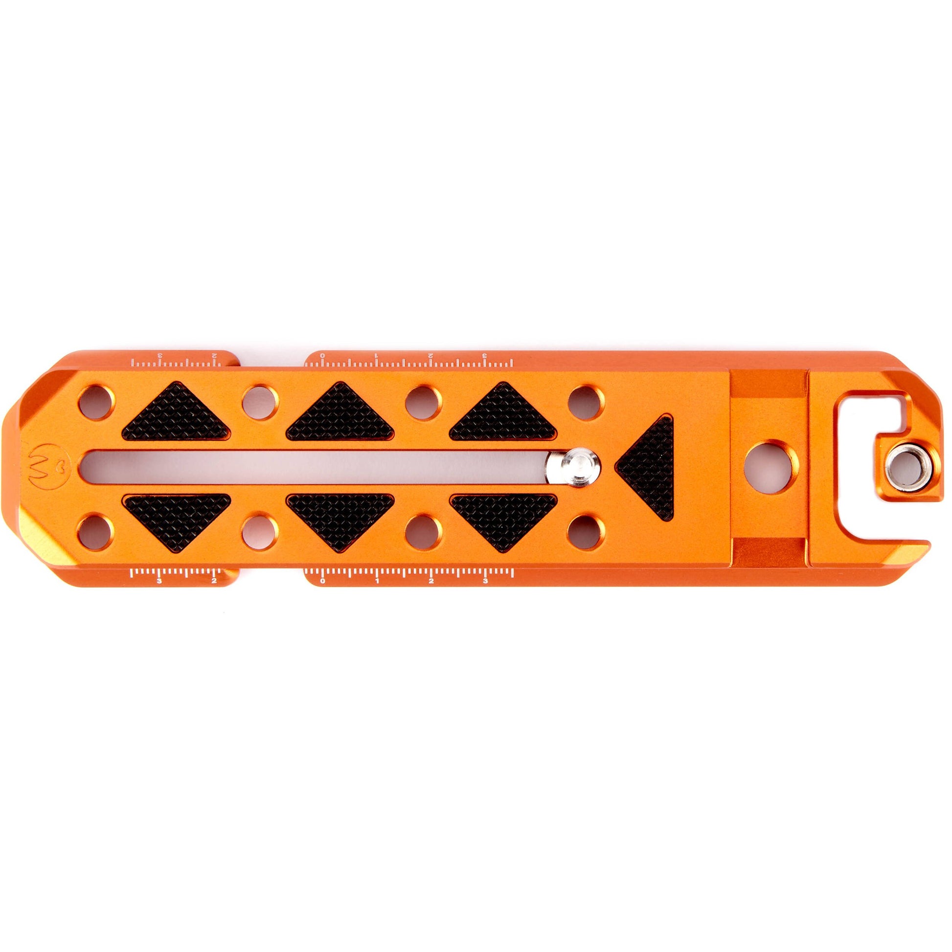Orange camera plate with various tools on a white background
