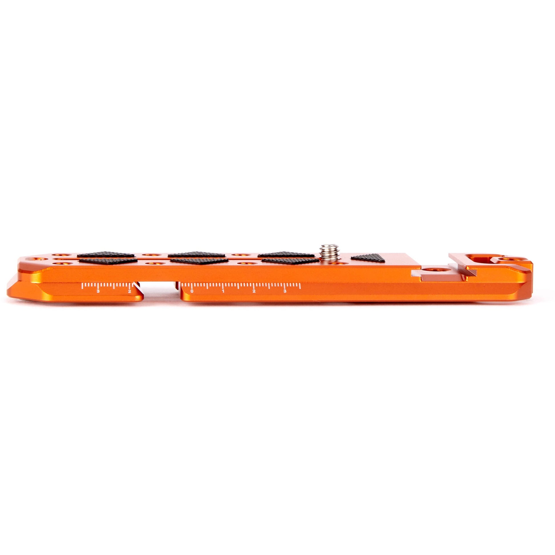 Orange metal plate with multiple components on a white background