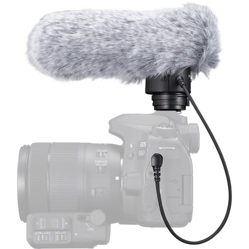 Camera with a microphone attached on a white background