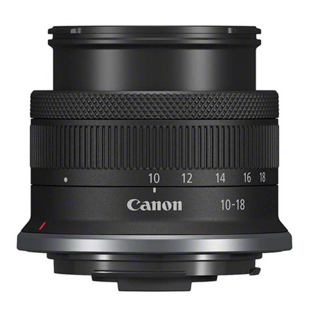 Canon camera lens with focus scale on a white background