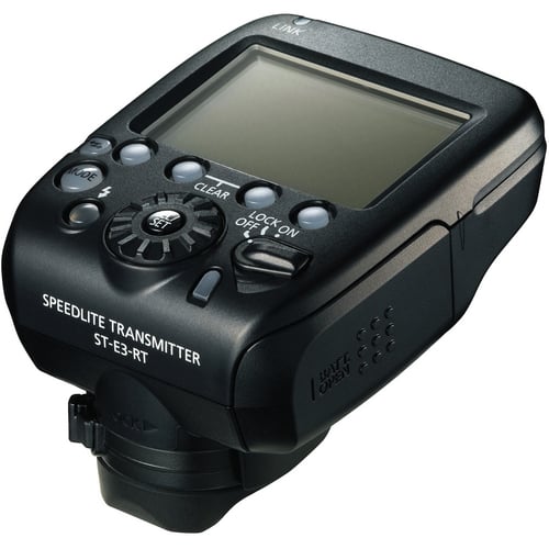 Black speedlite transmitter with control panel on a white background