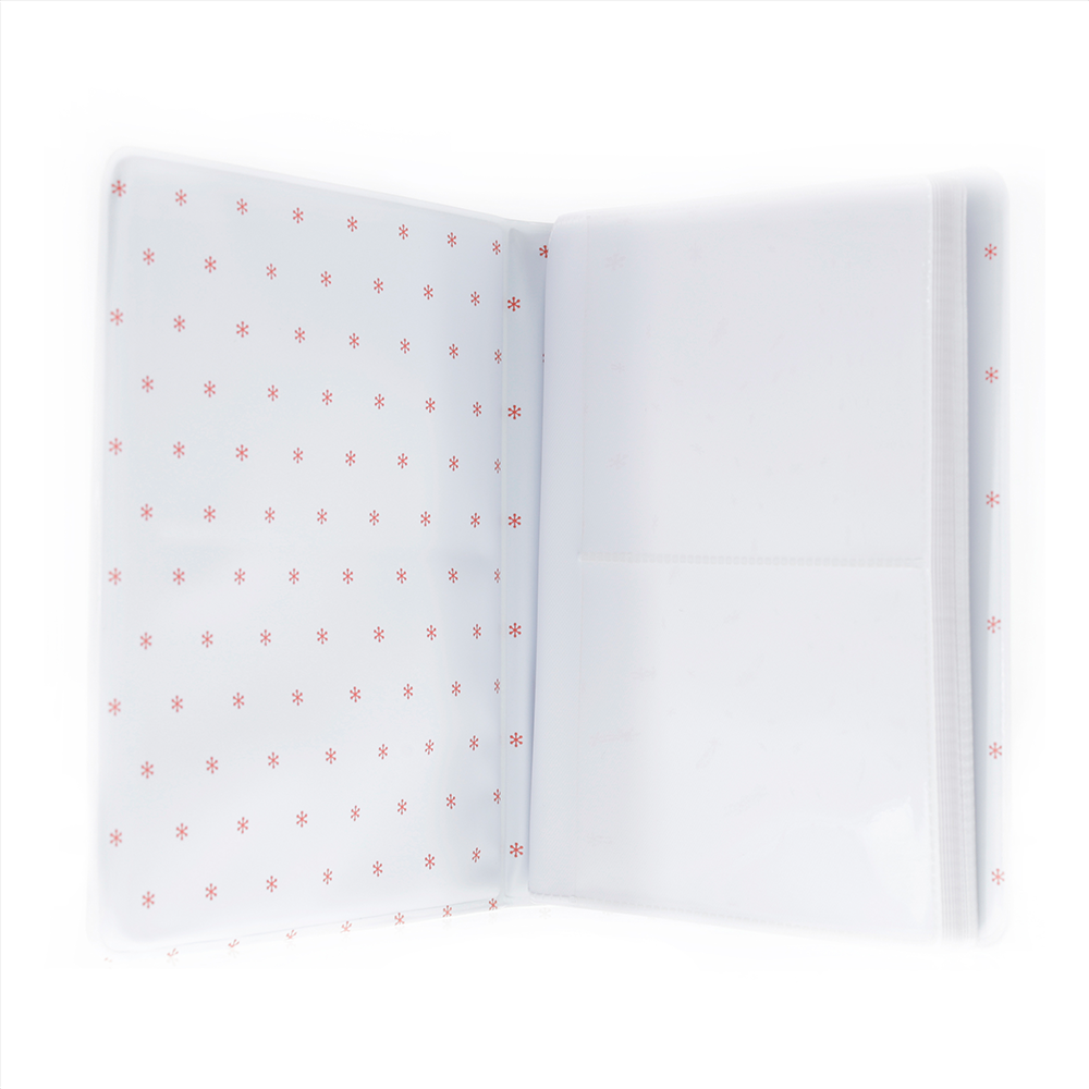 Open notebook with red star pattern on white pages