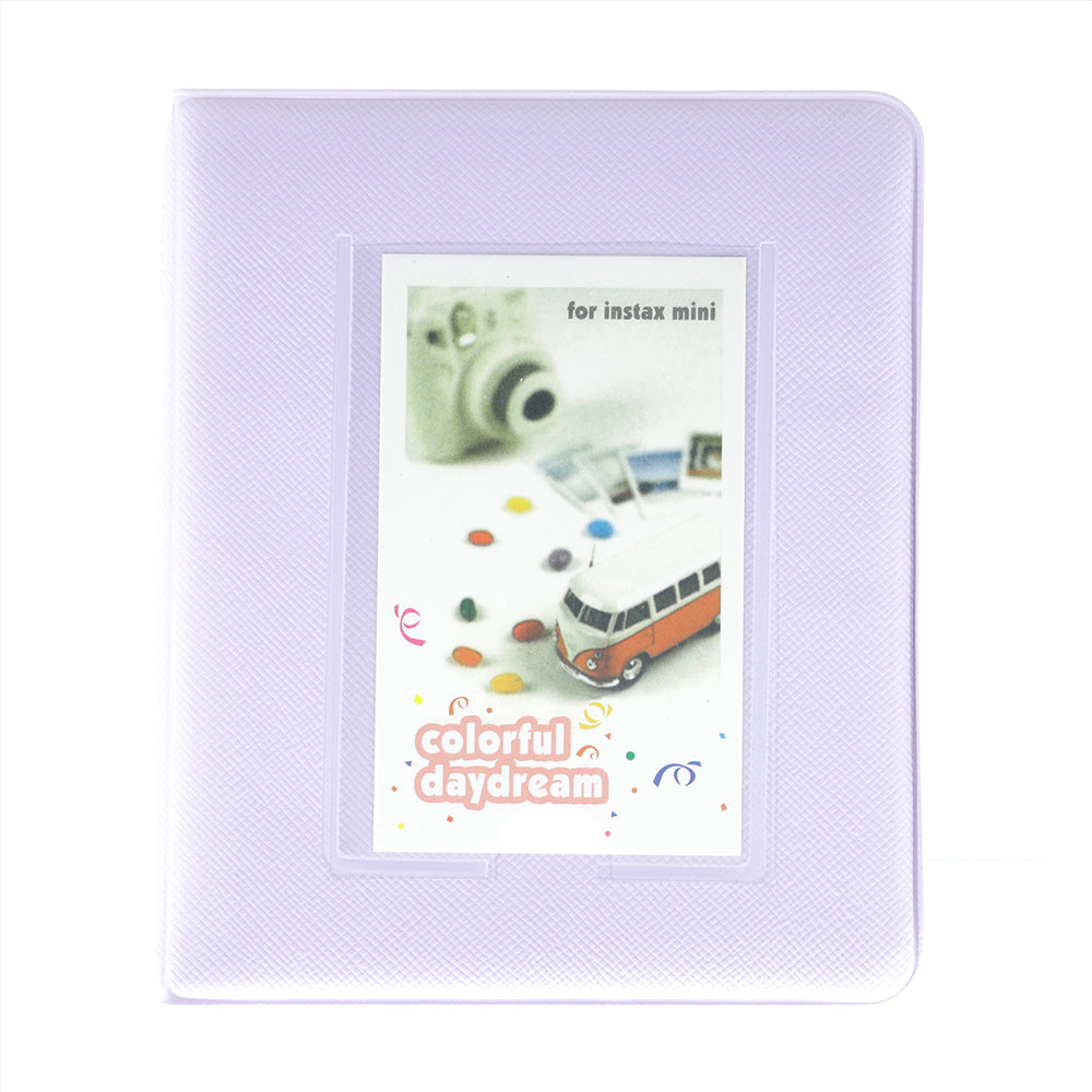 Purple photo album with a front cover featuring a camera and car illustration, labeled 'colorful daydream'.