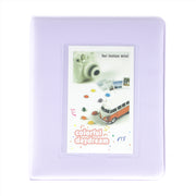 Purple photo album with a front cover featuring a camera and car illustration, labeled 'colorful daydream'.
