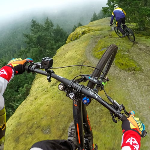 GoPro Handlebar / Seatpost / Pole Mount – versatile mounting accessory that securely attaches your GoPro camera to handlebars, seatposts, or poles for action filming.