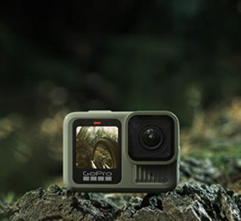 GoPro camera on a rock with a natural background