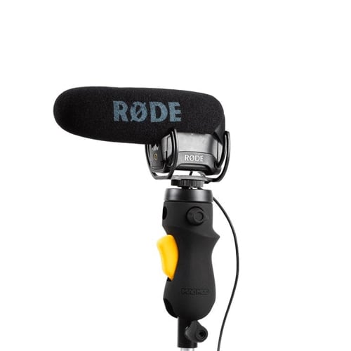 MagMod MagShoe 2 universal cold-shoe bracket with ergonomic pistol-style grip and orange release lever for one-handed flash or modifier mounting.