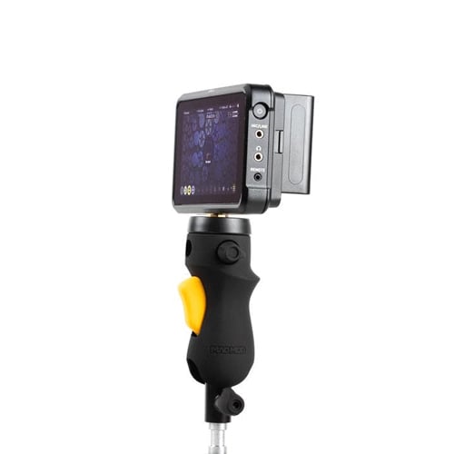 MagMod MagShoe 2 universal cold-shoe bracket with ergonomic pistol-style grip and orange release lever for one-handed flash or modifier mounting.