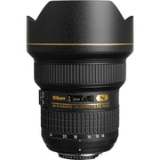 Nikon camera lens with focus ring and brand logo on a white background