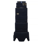 Black camera lens with multiple sections on a white background