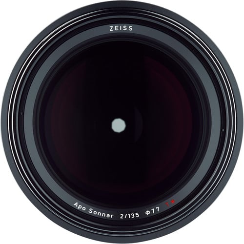 Zeiss Milvus 135mm f/2 ZE for Canon EF. Medium telephoto prime lens with Sonnar design, f/2 aperture, manual focus, and weather-sealed build.