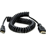 Coiled HDMI cable on a white background