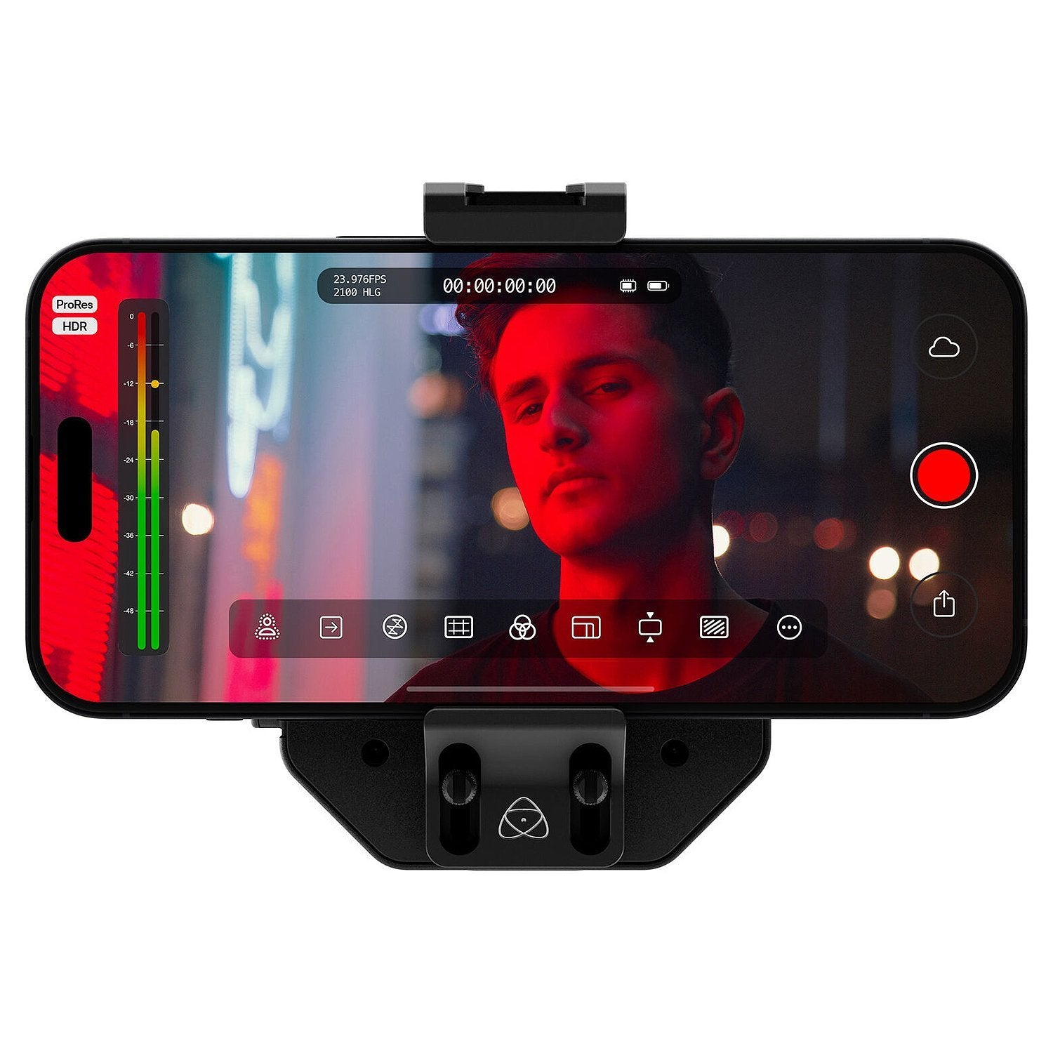 Atomos Ninja Phone video co-processor — compact black module with locking cable connector, metal housing, and HDMI/USB-C ports for professional iPhone video workflow.