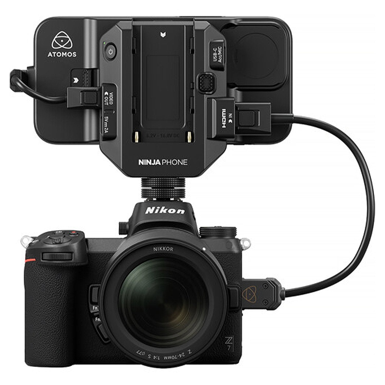 Atomos Ninja Phone video co-processor — compact black module with locking cable connector, metal housing, and HDMI/USB-C ports for professional iPhone video workflow.