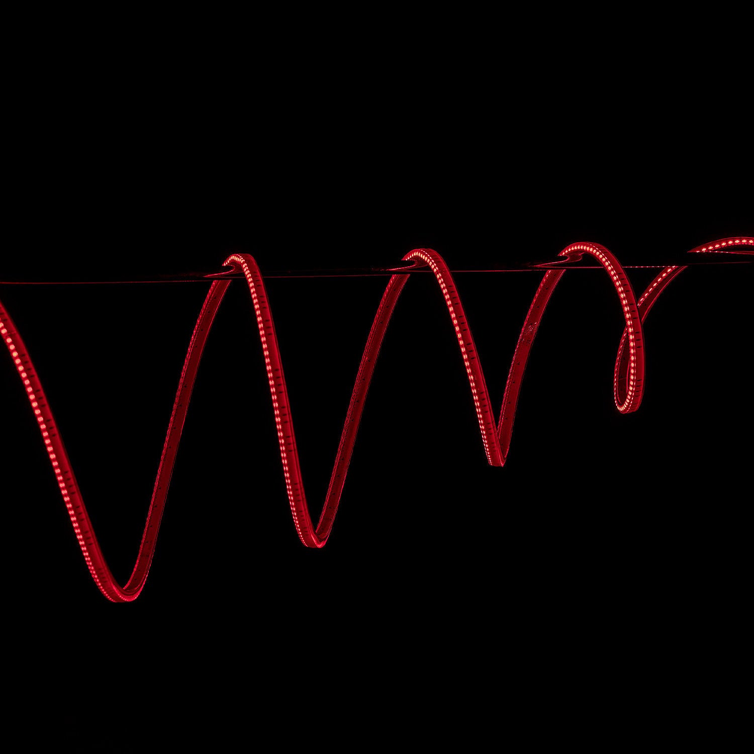 Reg LED strip light on a black background
