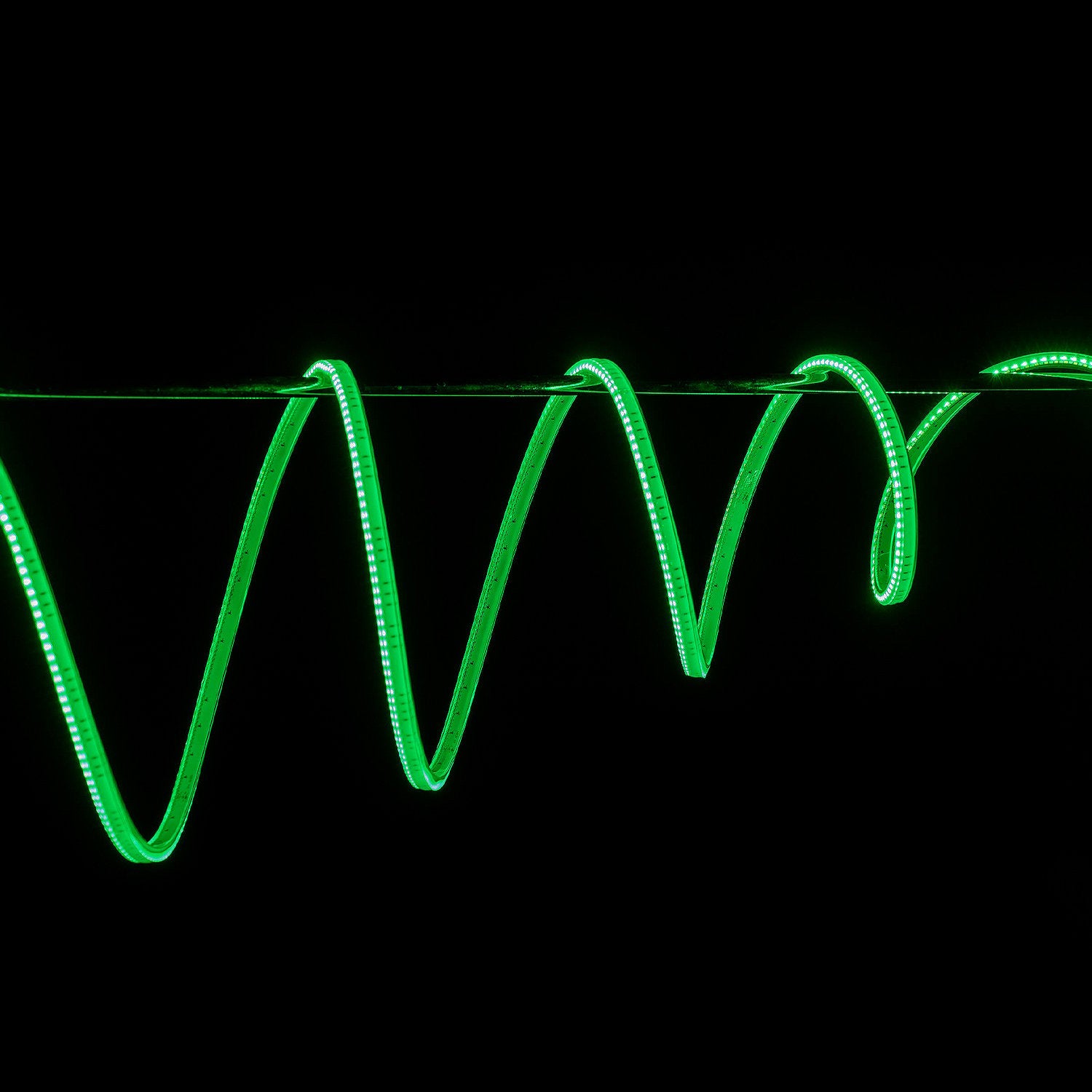 Green LED strip light on a black background