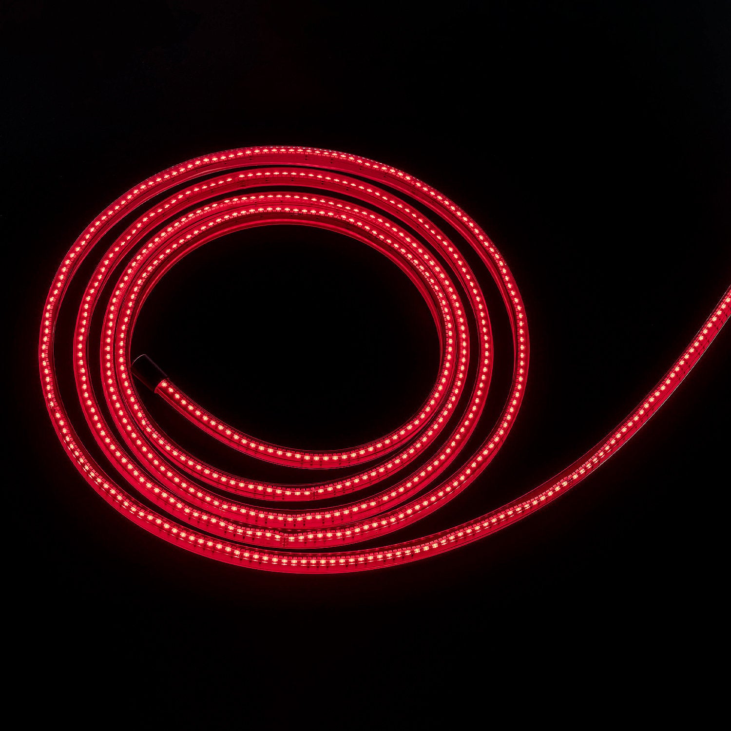 Red LED strip light on a black background