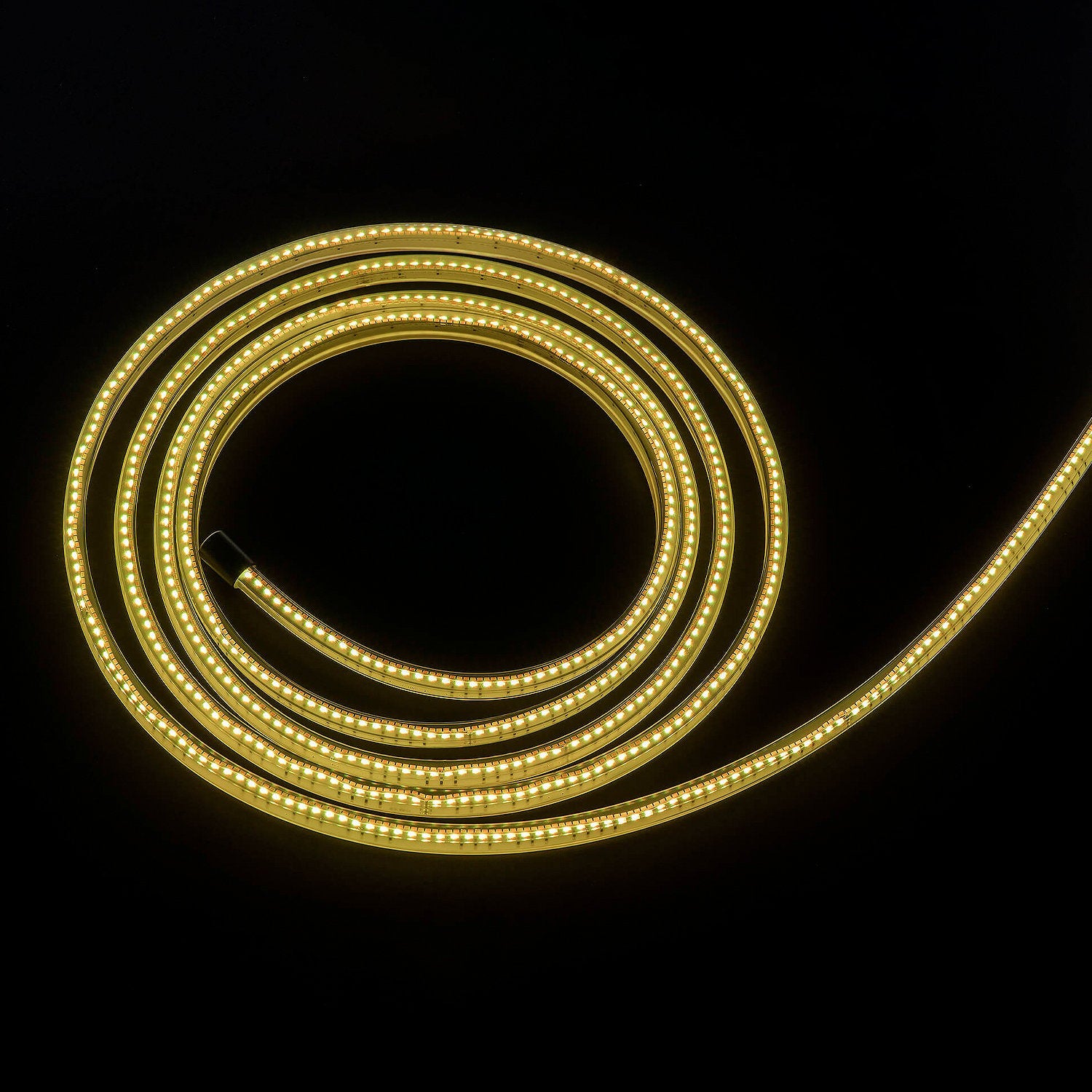Yellow LED strip light on a black background