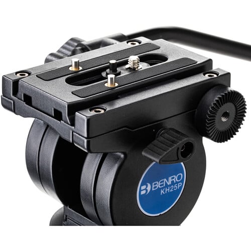 Benro KH25P video tripod in black with fluid video head attached, featuring three-section adjustable legs with flip locks, integrated mid-level spreader, retractable spiked rubber feet, ergonomic fluid pan‑tilt head with control arms, quick‑release camera plate, and built-in bubble level.