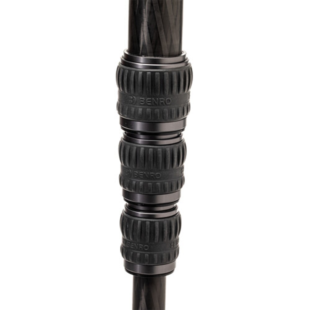 Benro SupaDupa carbon-fiber monopod with integrated pan‑tilt head, twist‑lock sections and spiked/rubber rotating foot.